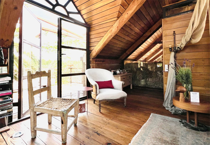 Bedroom in Pigcasso barn loft at farm sanctuary